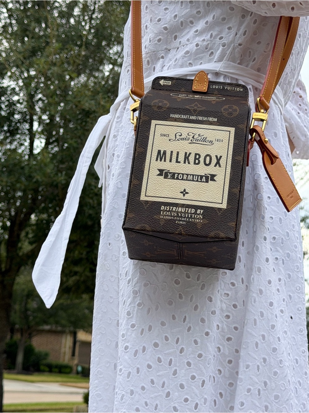 Isn’t this so cute? “Milkbox" Crossbody Bag